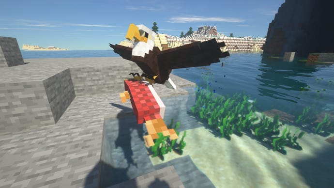 A bald eagle catches a fish on the coast in a Minecraft world with the Alex's Mobs mod enabled.