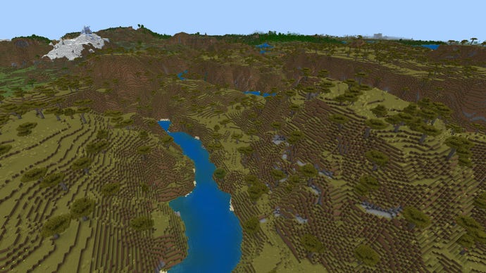 A Minecraft Bedrock landscape of savanna hills and rivers.