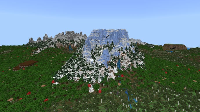 A large icy mountain rises out of a forest landscape in a Minecraft Bedrock world.