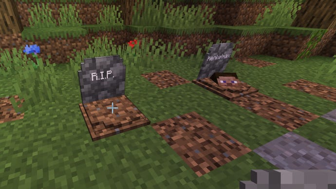Two gravestones in Minecraft side-by-side on some grassland, as part of the Gravestone Mod.