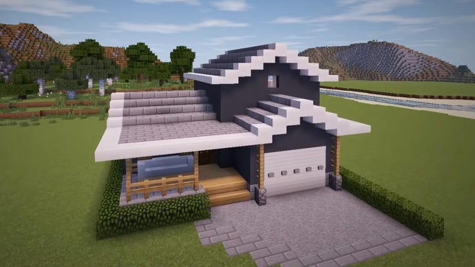 YouTuber rizzial द्वारे बांधलेले मिनीक्राफ्टमधील एक उपनगरीय शैलीचे घर