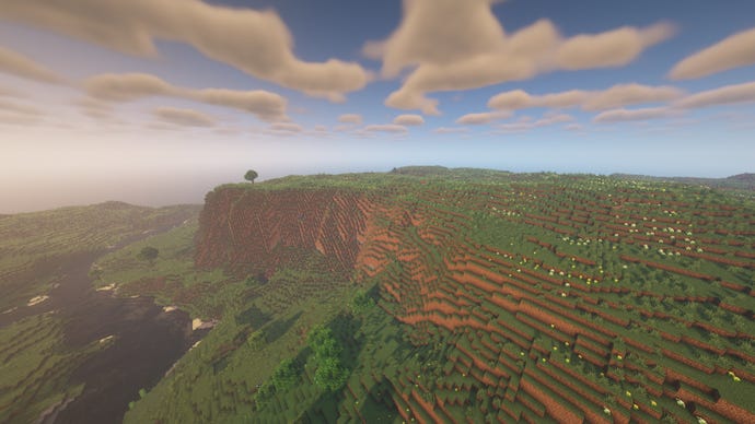 Un peisaj Minecraft de stânci și câmpii, cu un râu în stânga