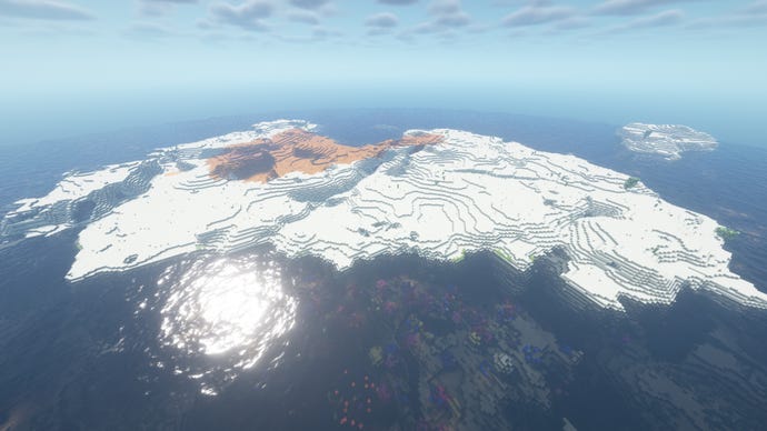 Sebuah pulau gurun di Minecraft, dengan dua pohon di sisi kanan, dan sepetak lahan badut ke belakang