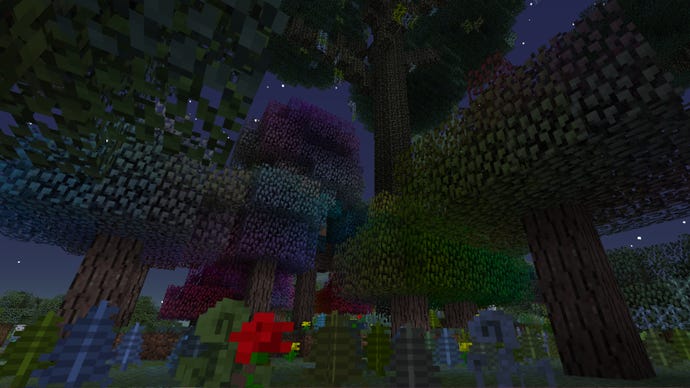 A rainbow tree forest at night from the Twilight Forest mod in Minecraft.