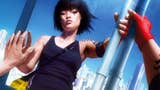 Concept art from Mirror's Edge, showing main character faith reaching out and touching the mirrored wall of a tall, shiny glass building. She sees her reflection - black vest, tattooed arm, bob haircut - against the backdrop of the skyscraper city behind her. There's a lot of piercing sky blue in the image.