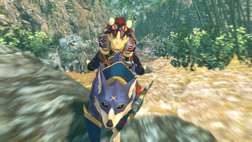 The player rides on a Palamute, a blue dog monster, as it charges towards the camera in Monster Hunter Stories 2.