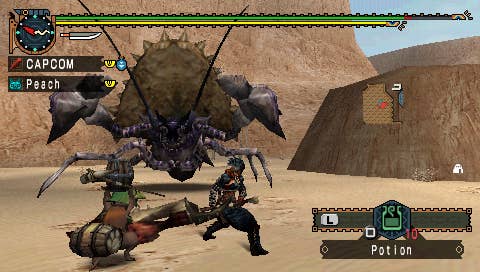 A player attacks a giant beast in Monster Hunter Freedom Unite for PSP