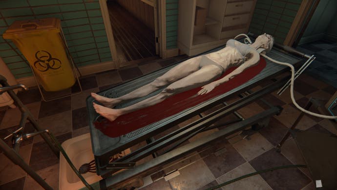 The body of an elderly lady on a mortuary table, undergoing the embalming process where blood drains from her body.
