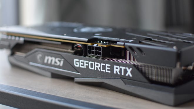 A close-up of the MSI GeForce RTX 3050 Gaming X 8G, showing the power connector.
