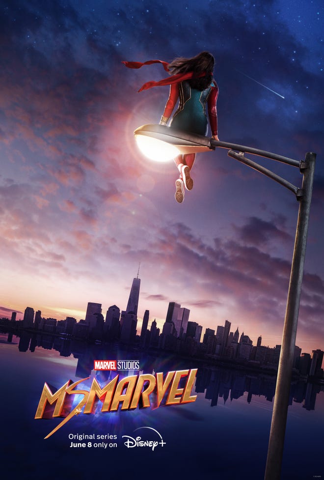 Ms. Marvel Disney+ Poster. Ms. Marvel sits on top of a streetlight, looking out at a skyline
