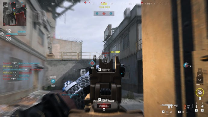 Firing the Bas battle rifle at an enemy in Modern Warfare 3's multiplayer.