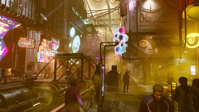 A street scene from planet Neon in Starfield, showing lots of cyberpunky shops with colourful glowing signs and smoggy yellow air.
