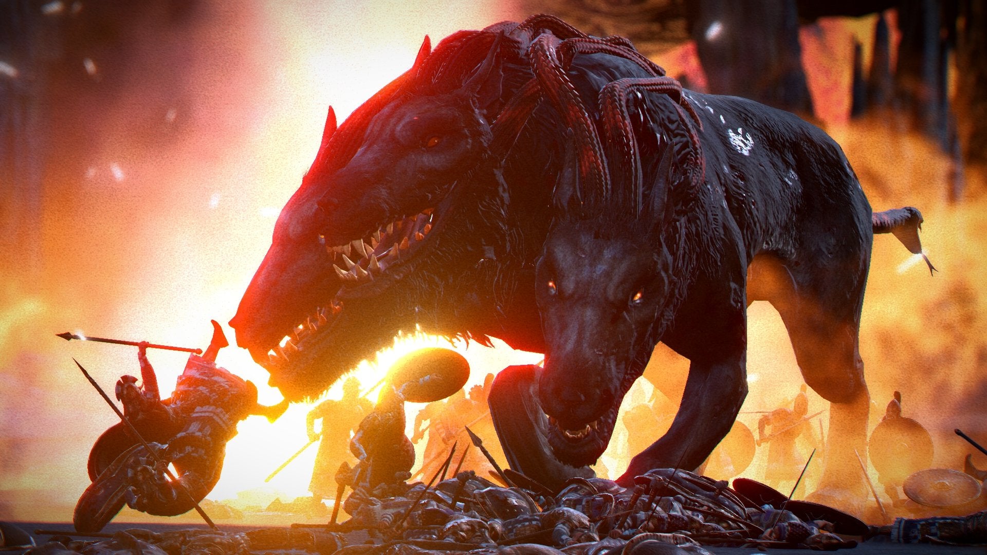 Cerberus runs onto a fiery battlefield in A Total War Saga: Troy's Mythos expansion