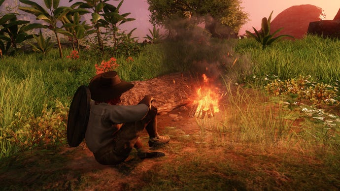 A player resting in front of a Camp fire in New World.