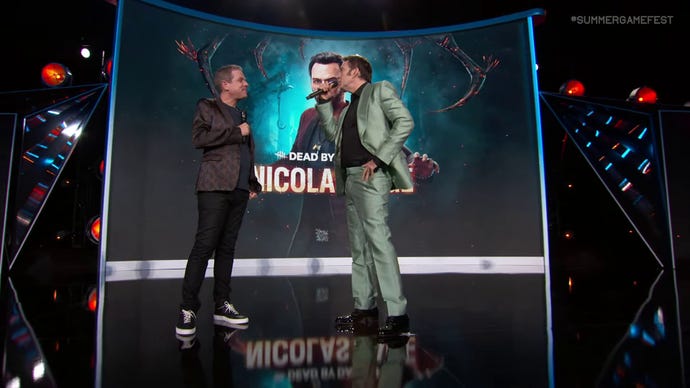 Nicolas Cage on stage at Summer Game Fest 2023, talking to Geoff Keighley and outclassing him