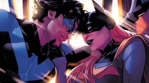 Image of Nightwing and Batgirl leaning close to each other and smiling