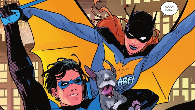Cropped image of Batgirl and Nightwing swinging through the sky, holding dog
