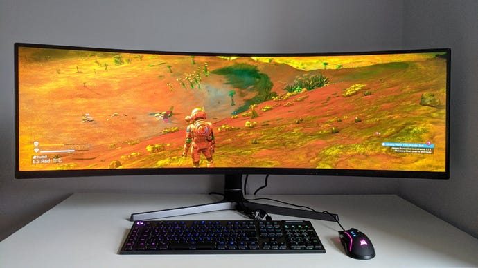 A photo of an ultrawide gaming monitor running No Man's Sky