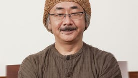 Final Fantasy composer Nobuo Uematsu smiles in a beanie hat and glasses