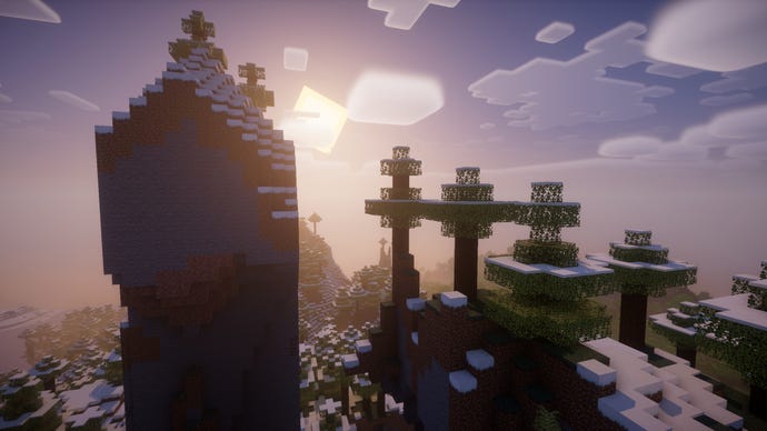 The sun rises over a snowy Minecraft forest.