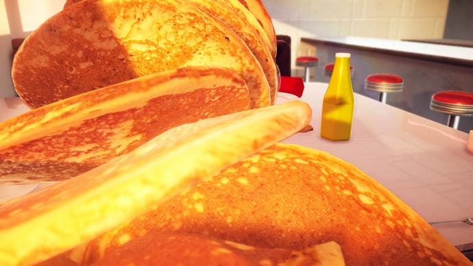 A screenshot from food game Nour, showing the biggest pancakes the world has ever seen, stacked up and falling towards the camera. Tuck in!