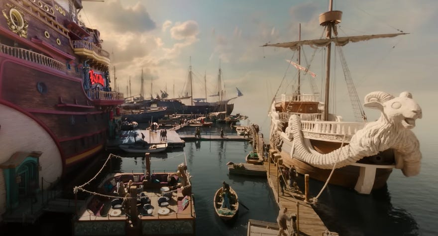 Still image from One Piece trailer featuring ships in harbor
