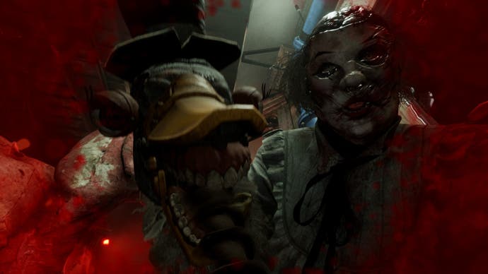 The Outlast Trails review screenshot, showing a woman in a creepy mask holding a terrifying horse-like puppet. Blood smears the corners of the screen