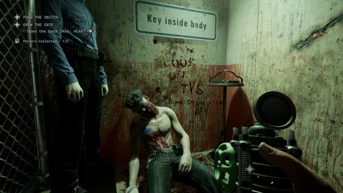 Screenshot from an Outlast Trails comment, showing the body of a police officer with a blue key scrawled across his chest. 
