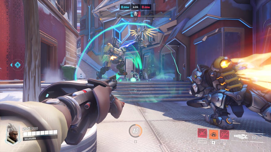 The player in Overwatch 2 shoots a Disruptor Shot as Sojourn towards the enemy team in front of them.