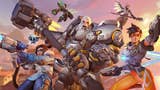 Artwork for Overwatch 2 showing a selection of its heroes posing dramatically against a reddening sky.