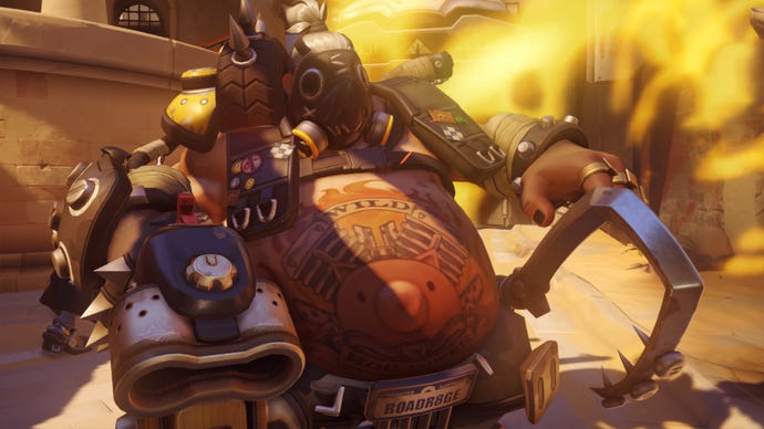 Roadhog, a hero in Overwatch 2, aims at the camera with his shotgun.