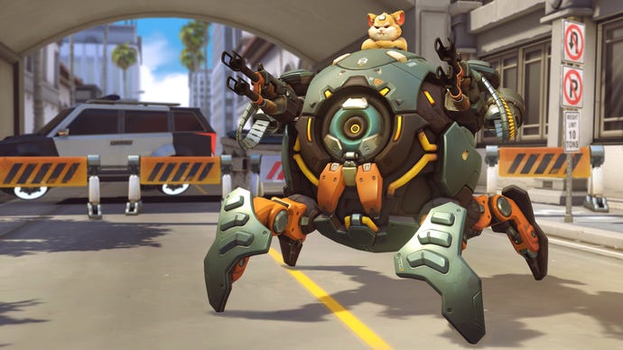 Wrecking Ball, a hero in Overwatch 2, stands on a road in front of the camera.