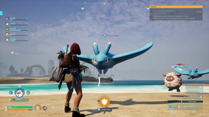 A female character prepares to attack a floating blue water creature in Palworld