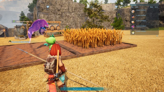 A female character watches as monsters farm a wheat field in Palworld