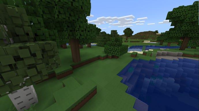 A Minecraft Bedrock screenshot of a landscape displayed using the PaperCutout Texture Pack.