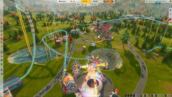 A park in Park Beyond featuring several rides, a cavern and a lake, with a rollercoaster weaving around it all