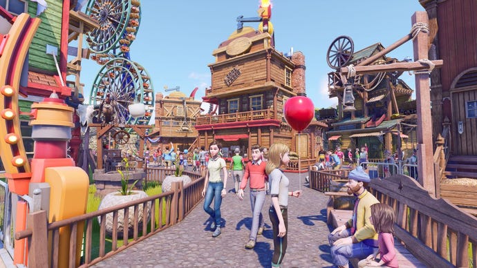 Visitors walking through a wild west themed park in park beyond