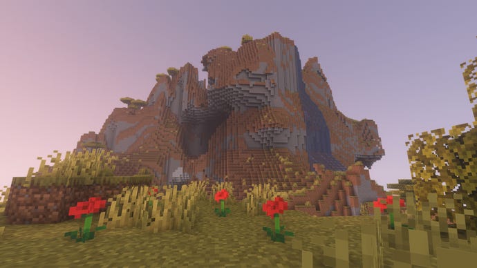 An extreme hills biome in Minecraft, with roses in the foreground.