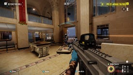 The player fires on a guard inside a bank in Payday 2