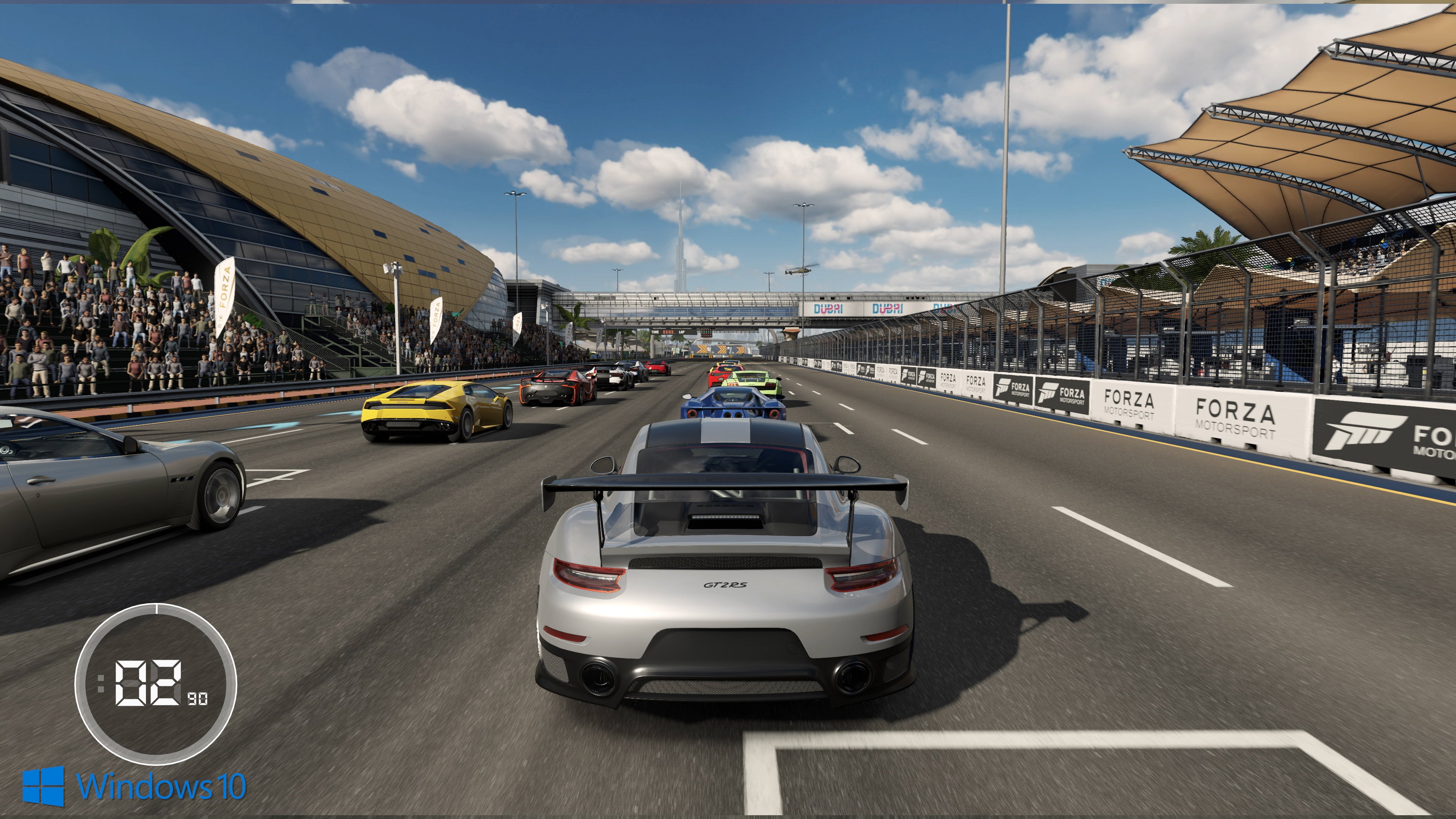 How does Forza 7 improve on Xbox One X over base hardware