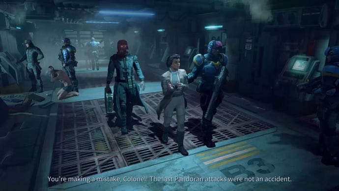 Three officials argue in a hallway in Phoenix Point.