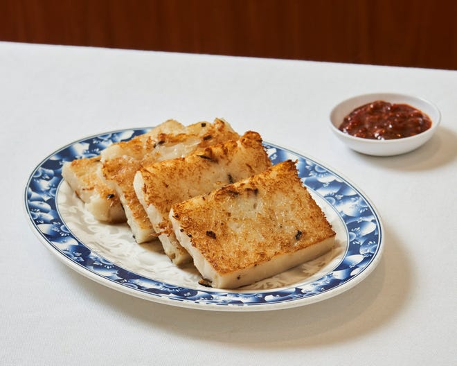 Photograph of radish cakes on a blue and grey plate