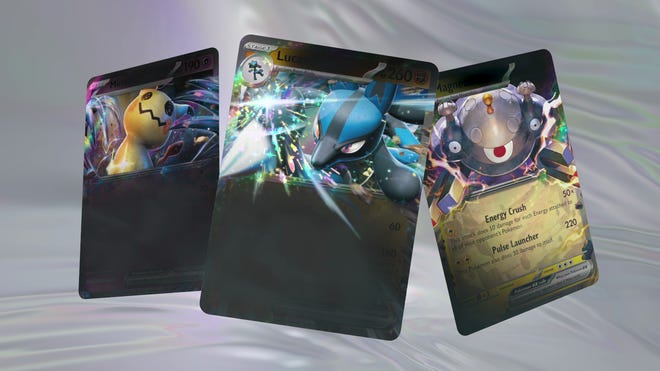 Three Pokémon-ex from the upcoming TCG set, including Lucario, Magnezone and Mimikyu.
