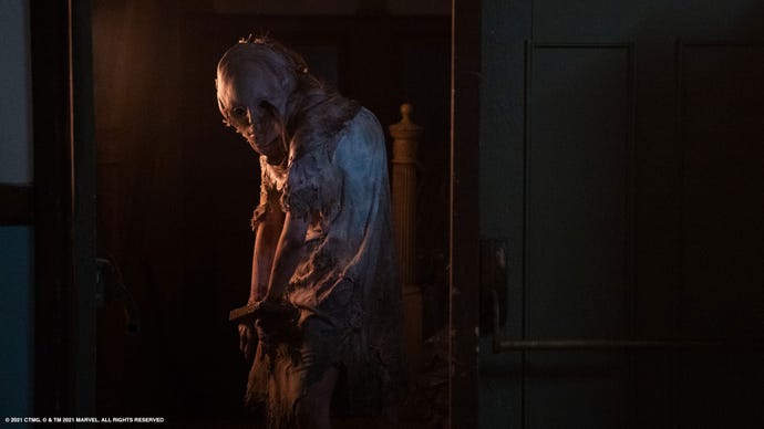 A screenshot of Marina Mazepa as Lisa Trevor, a tortured and mutated monster-girl, in Resident Evil: Welcome To Raccoon City
