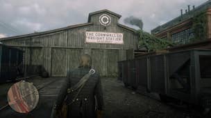Arthur Morgan approaching the Cornwall Freight Station building in Red Dead Redemption 2.