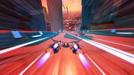 A ship in Redout 2 blasting down a neon red track, orange cityscape in the distance.