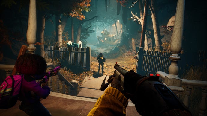 Three players stare down a spooky forest path in Redfall.