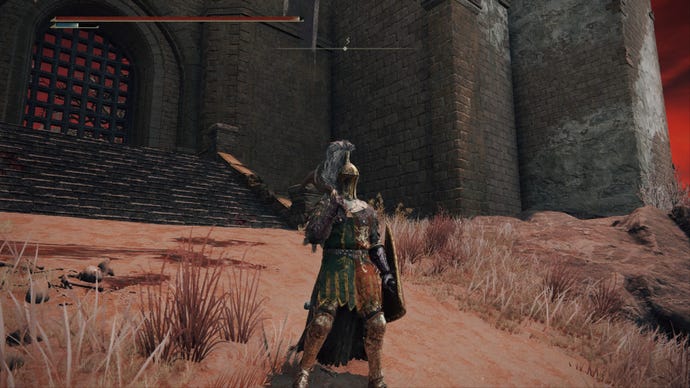 Elden Ring player standing at the main gate of Redmane Castle, at the top of a hill
