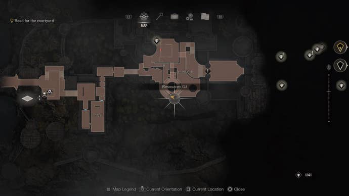 Ein Kartenbildschirm, der die Position eines blauen Medaillons im Schlosstor von Resident Evil 4 zeigt 4
