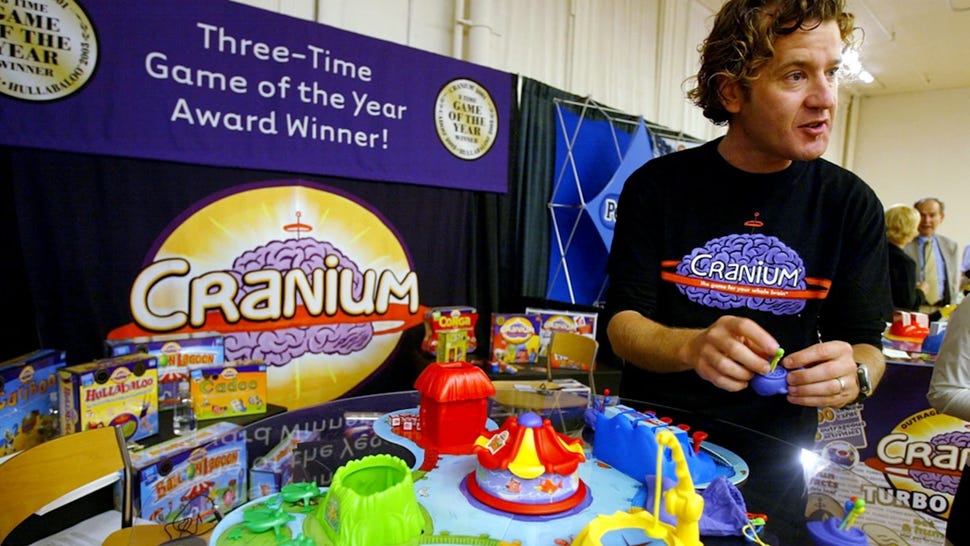 Richard Tait stands in front of a variation of party game Cranium at a convention in the early 2000s.